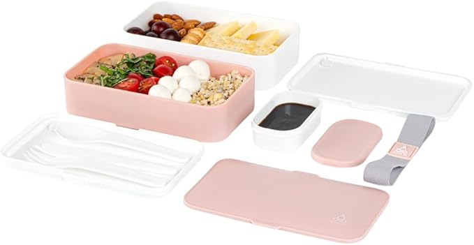 Restaurantware Bento Tek 40.5 Ounces Stackable Lunch Box 1 Reusable Adult Lunch Container - With Utensils Included Sauce Cup Pink & White Plastic Layered Lunch Box Microwavable Dishwashable
