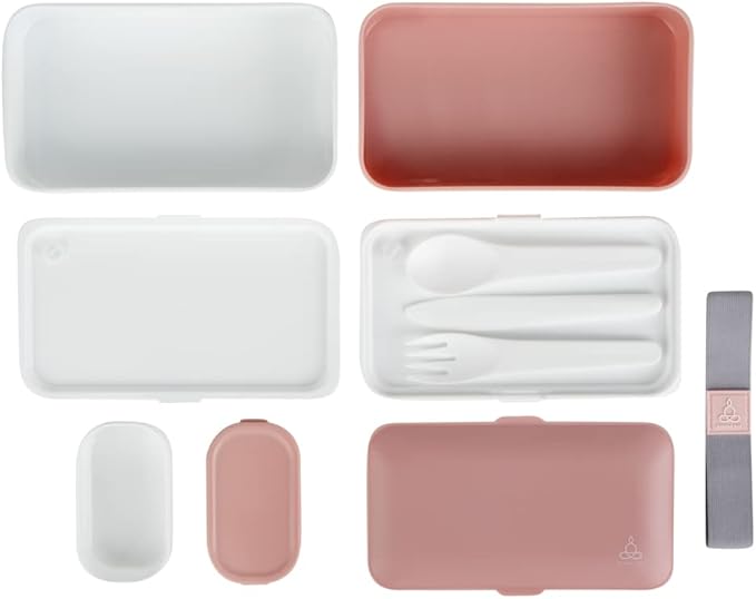 Restaurantware Bento Tek 40.5 Ounces Stackable Lunch Box 1 Reusable Adult Lunch Container - With Utensils Included Sauce Cup Pink & White Plastic Layered Lunch Box Microwavable Dishwashable