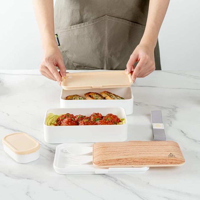 Restaurantware Bento Tek 40.5 Ounces Stackable Lunch Box 1 Reusable Adult Lunch Container - With Utensils Included Sauce Cup Wood Grain & White Plastic Layered Lunch Box Microwavable Dishwashable