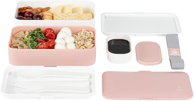 Restaurantware Bento Tek 40.5 Ounces Stackable Lunch Box 1 Reusable Adult Lunch Container - With Utensils Included Sauce Cup Pink & White Plastic Layered Lunch Box Microwavable Dishwashable