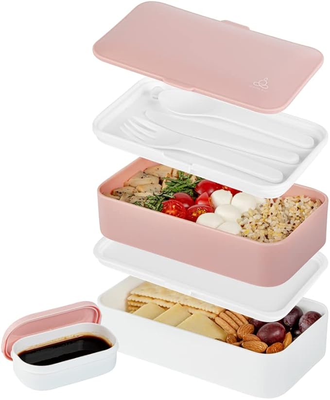 Restaurantware Bento Tek 40.5 Ounces Stackable Lunch Box 1 Reusable Adult Lunch Container - With Utensils Included Sauce Cup Pink & White Plastic Layered Lunch Box Microwavable Dishwashable