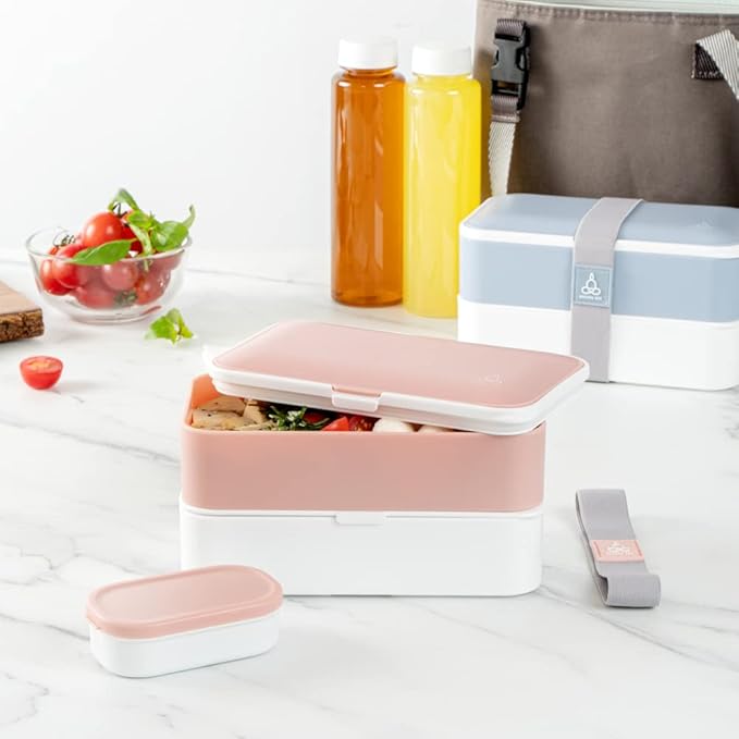 Restaurantware Bento Tek 40.5 Ounces Stackable Lunch Box 1 Reusable Adult Lunch Container - With Utensils Included Sauce Cup Pink & White Plastic Layered Lunch Box Microwavable Dishwashable