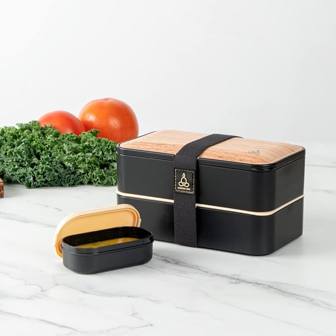 Restaurantware Bento Tek 40.5 Ounces Stackable Lunch Box 1 Reusable Adult Lunch Container - With Utensils Sauce Cup Wood Grain & Black Plastic Layered Lunch Box Microwavable Dishwashable