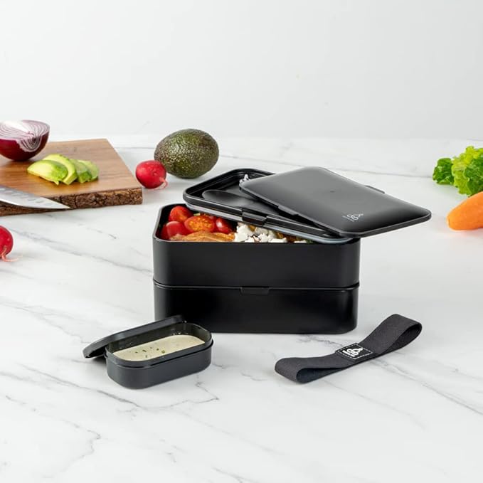 Restaurantware Bento Tek 40.5 Ounces Stackable Lunch Box 1 Reusable Adult Lunch Container - With Utensils Included Sauce Cup Black Plastic Layered Lunch Box Microwavable Dishwashable