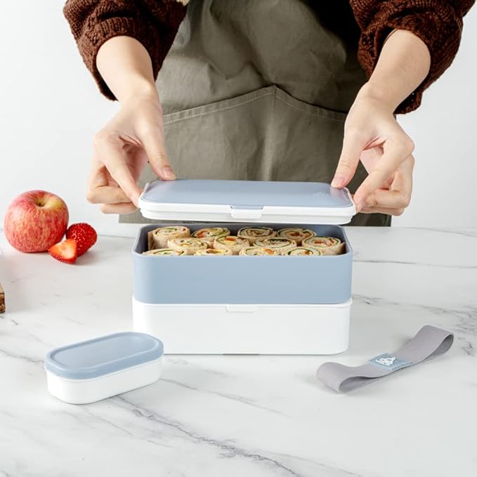 Restaurantware Bento Tek 40.5 Ounces Stackable Lunch Box 1 Reusable Adult Lunch Container - With Utensils Included Sauce Cup Blue & White Plastic Layered Lunch Box Microwavable Dishwashable