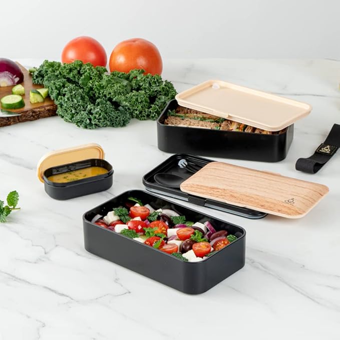 Restaurantware Bento Tek 40.5 Ounces Stackable Lunch Box 1 Reusable Adult Lunch Container - With Utensils Sauce Cup Wood Grain & Black Plastic Layered Lunch Box Microwavable Dishwashable