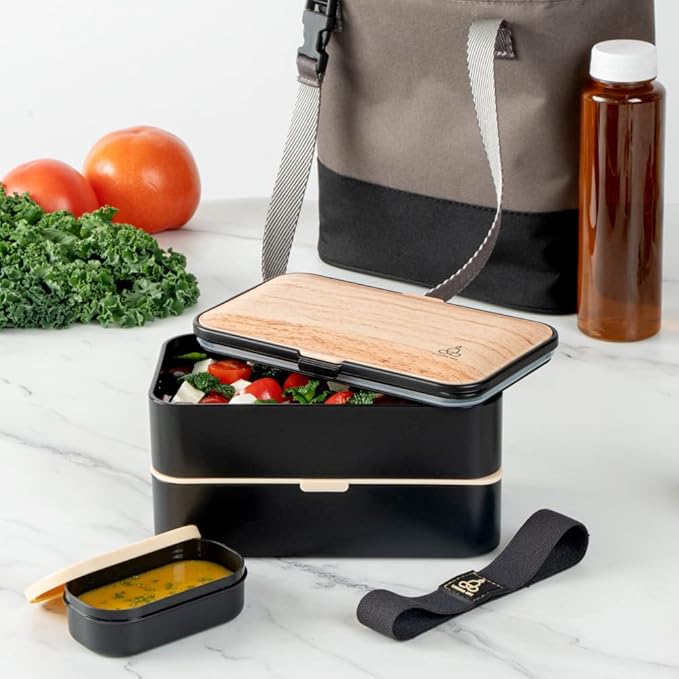 Restaurantware Bento Tek 40.5 Ounces Stackable Lunch Box 1 Reusable Adult Lunch Container - With Utensils Sauce Cup Wood Grain & Black Plastic Layered Lunch Box Microwavable Dishwashable